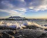 Table Mountain rises up from the Atlantic Ocean.
