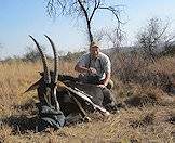 Frans Gresse with a sable antelope trophy.