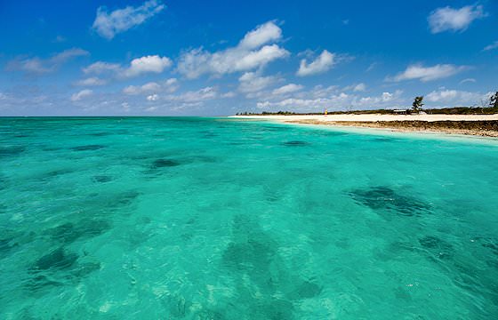 The azure waters of the Indian Ocean surround Mozambique..