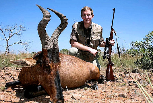 Red hartebeest trophies presented for a commemorative shot.