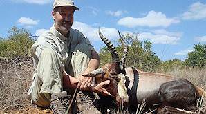 A hunter with his blesbok trophy.