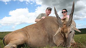 A pair of proud hunters pose with their eland trophy.