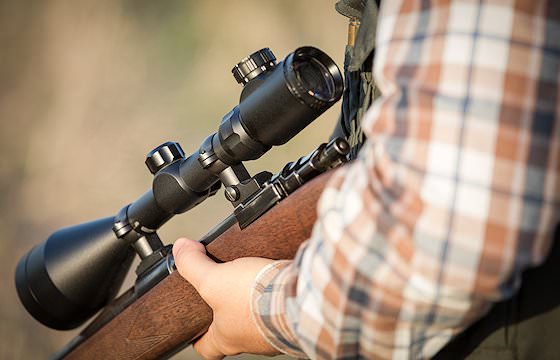 A scope on a rifle.