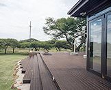 A sprawling wooden deck surrounds the camp.