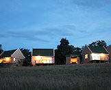 The Eastern Cape hunting camp lit up at night.