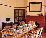 The table is set for breakfast at the hunting camp.