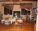 Antique furnishings complement the old-world atmosphere of the dining room.