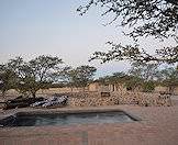 Ward off the Kalahari heat in the camp's swimming pool.