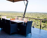 A chic dining set on the camp's patio.