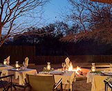 A table set up for dinner in the boma.