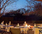 A table set up for dinner in the boma.