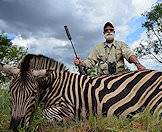A proud zebra hunter.