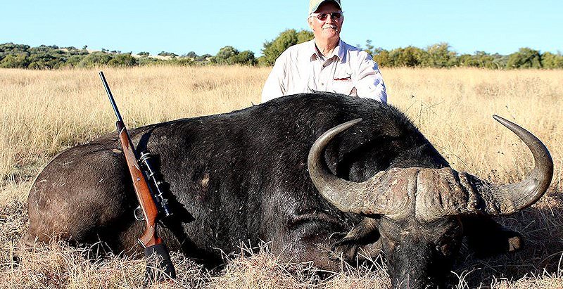 A proud hunter with his Cape buffalo trophy.