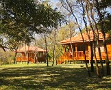 The wooden cabins of the Rust de Winter hunting camp.